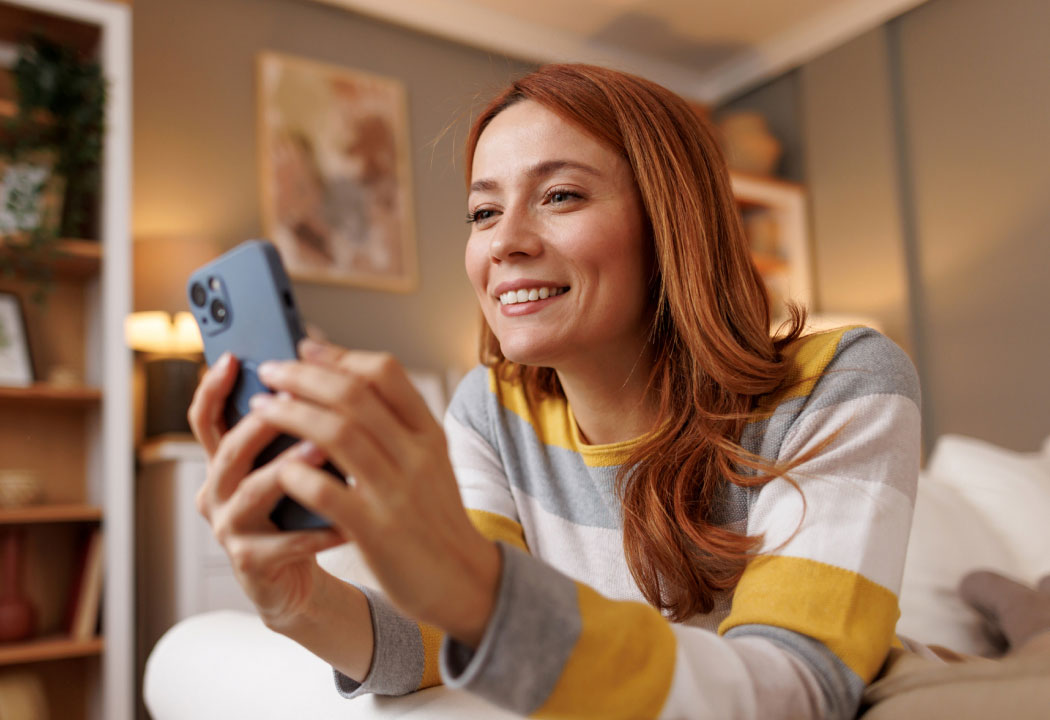 young woman holding a smartphone