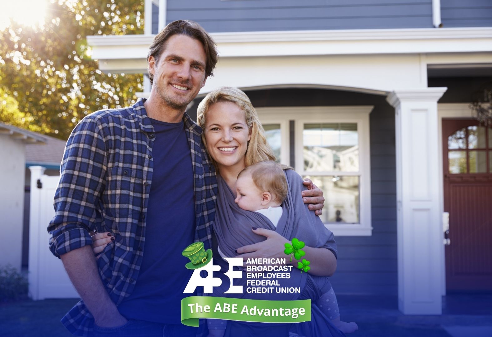 happy family standing in front of home